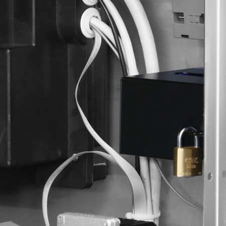 Lockable coin compartment