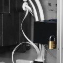 Lockable coin compartment